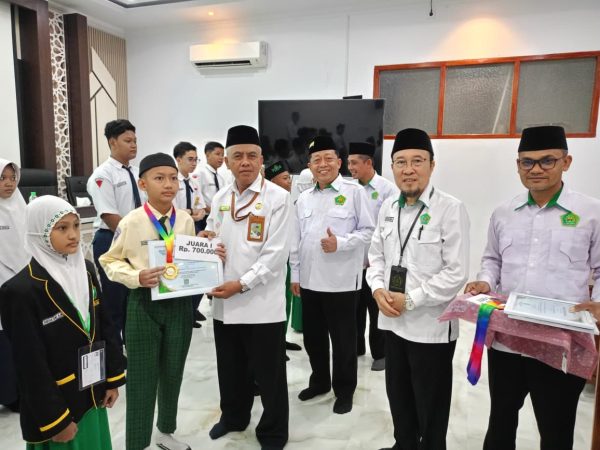 OMI Tingkat Provinsi Dimulai, Murid MI Murni Ikuti Sesi Kompetisi di MA Matholiul Anwar